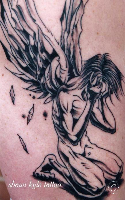 sad angel tattoos