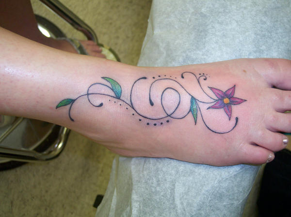 Swirly foot tattoo | Flower Tattoo