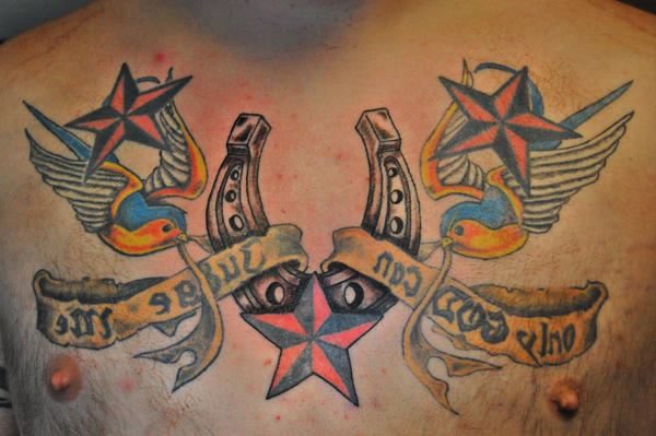 tattoos for guys chest. star tattoos for men on chest.