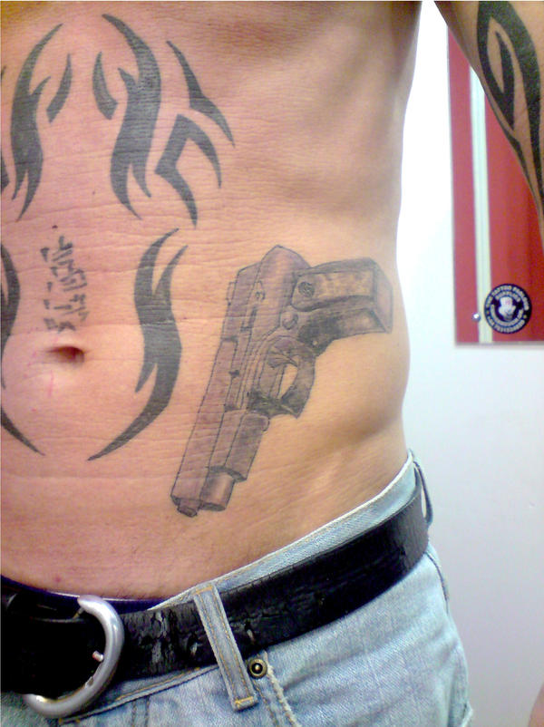 gun tattoos j5 gun healed