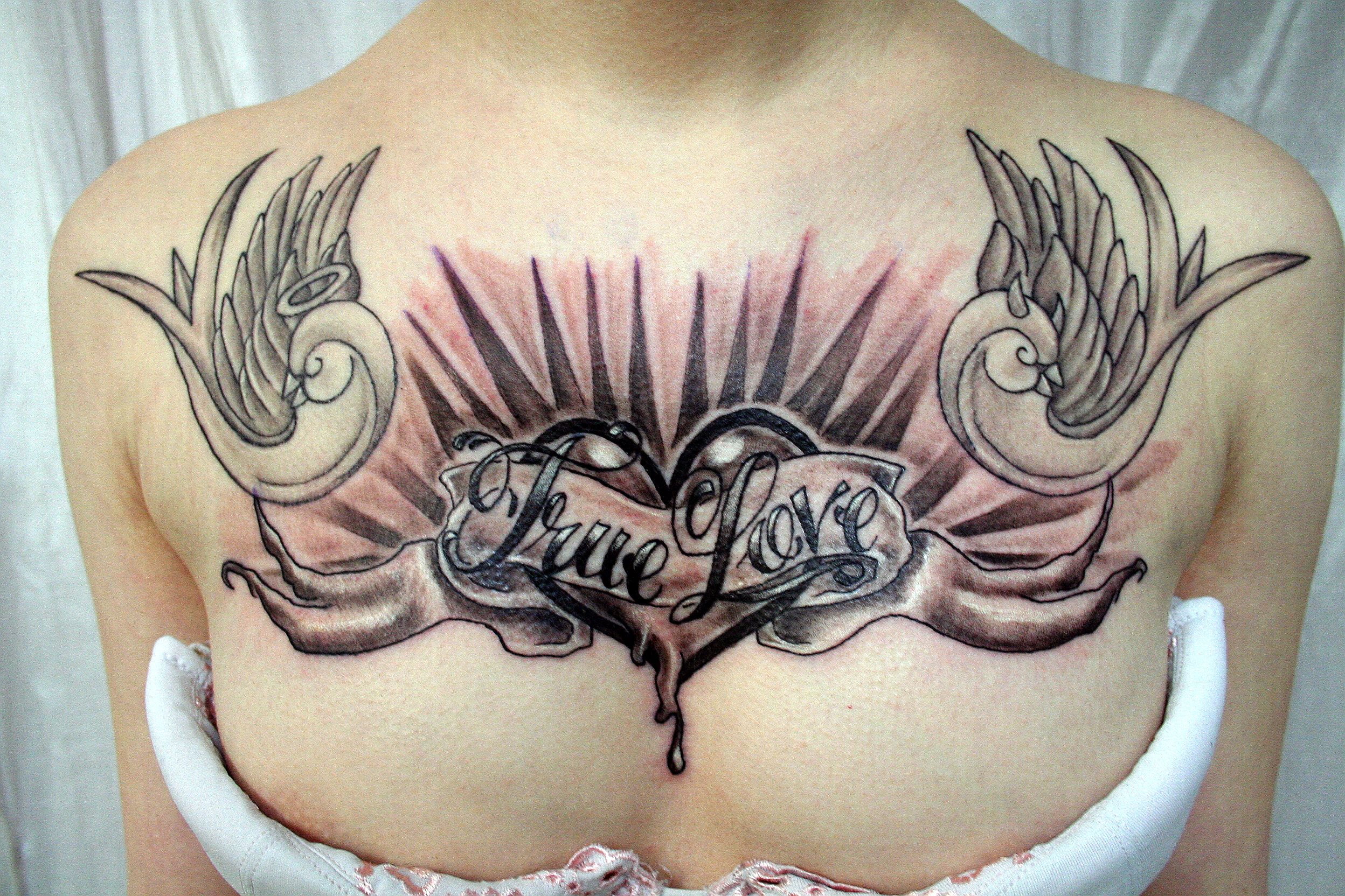 http://fc01.deviantart.net/fs29/f/2008/080/1/b/True_Love_Lettering_Heart_TaT_by_2Face_Tattoo.jpg