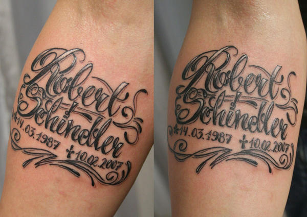 faux indentation of old english lettering tattoo in black and greywash