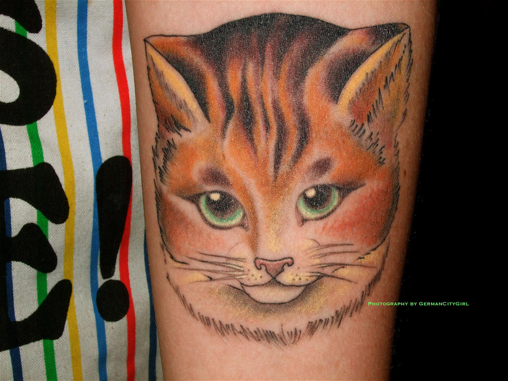 http://fc01.deviantart.net/fs40/i/2009/026/4/e/Cat_Tattoo__by_GermanCityGirl.jpg