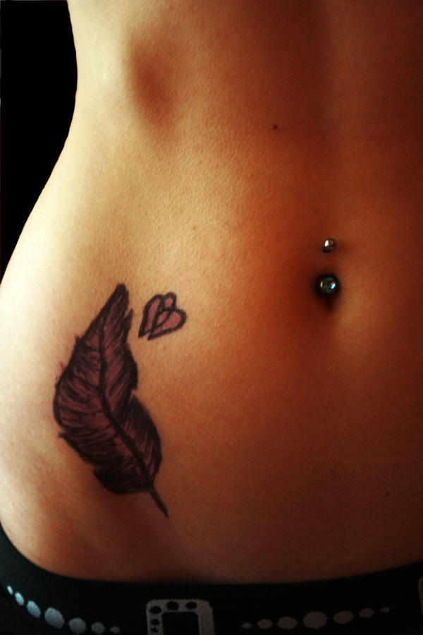 Tummy tattoo and piercing