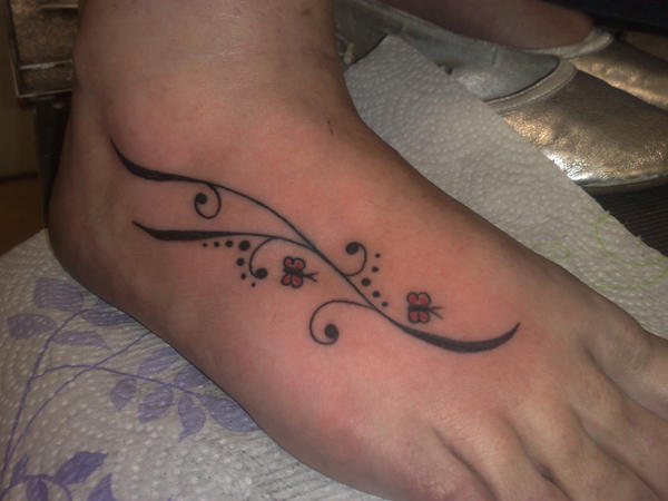 foot tattoo by GetSomeInk on deviantART
