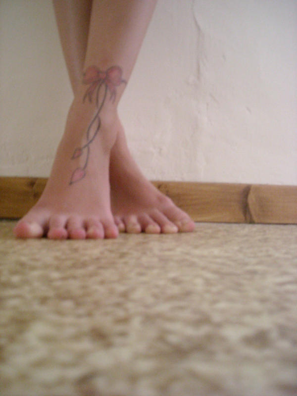 bow tattoo on ankle. The ow tattoo by