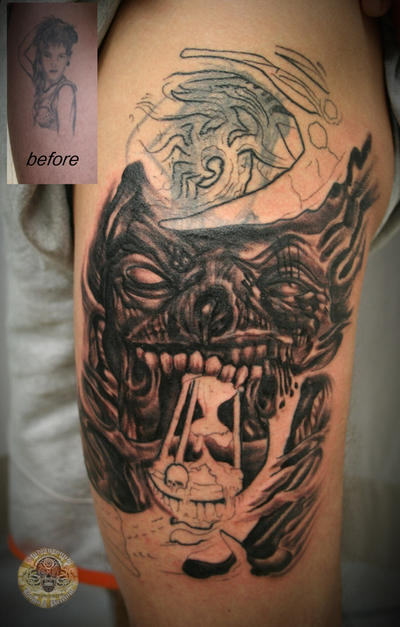 cover up skull face tat by