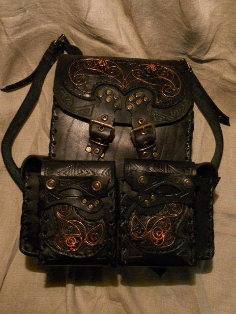 a_leather_backpack_with_copper_ornament_by_chancezero-d552vw1.jpg