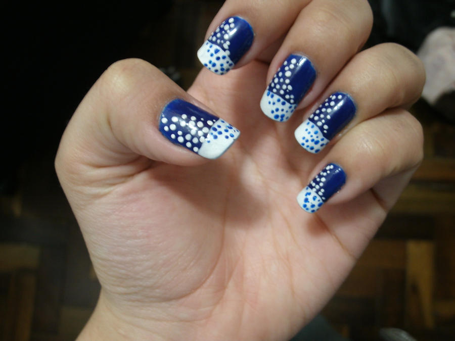 simple white and blue nail art. My mom says it's stars, my friend ...
