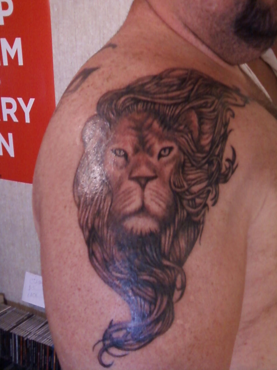 lion tattoo by pinkminkink on
