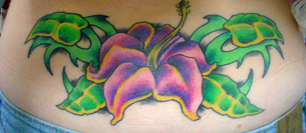 lower back flower - flower tattoo